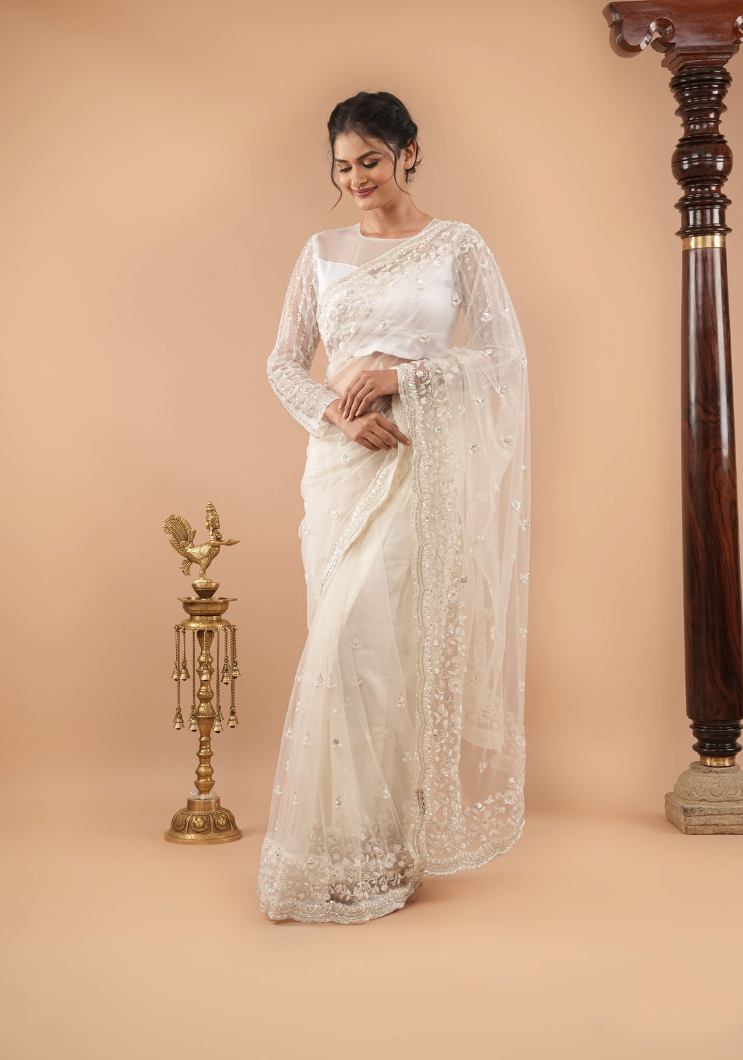 Ivory Net Saree with half jaal sequin and beadwork embellishments