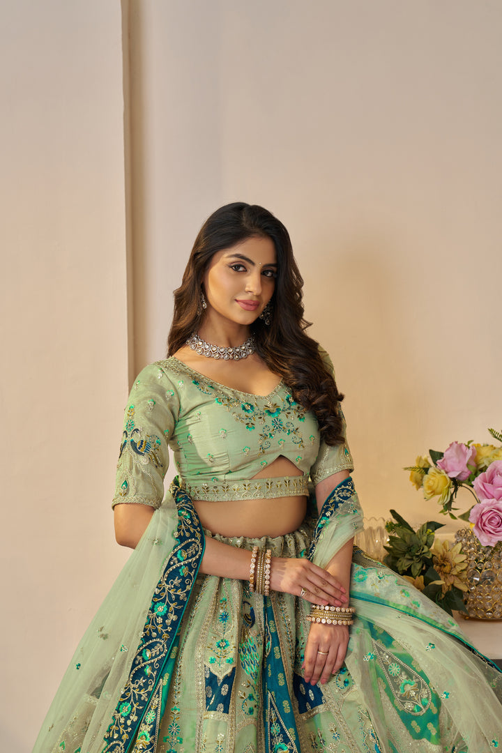 Vantara Patchwork Banarasi Lehenga in Emerald Green