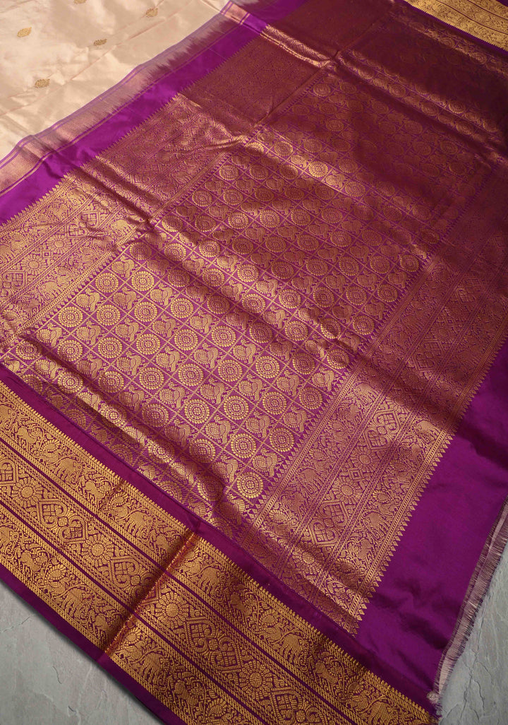 Peach Cream color 9 Yards Madisaar Pure Silk Saree with Zari Buttas and Contrast Zari Border | SILK MARK CERTIFIED