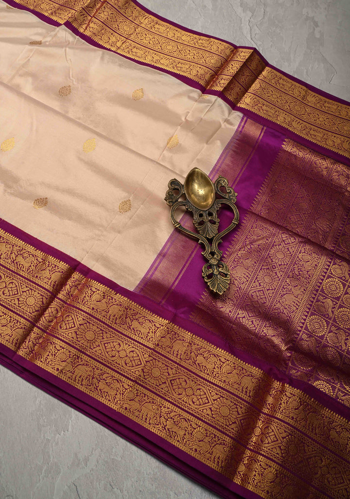 Peach Cream color 9 Yards Madisaar Pure Silk Saree with Zari Buttas and Contrast Zari Border | SILK MARK CERTIFIED