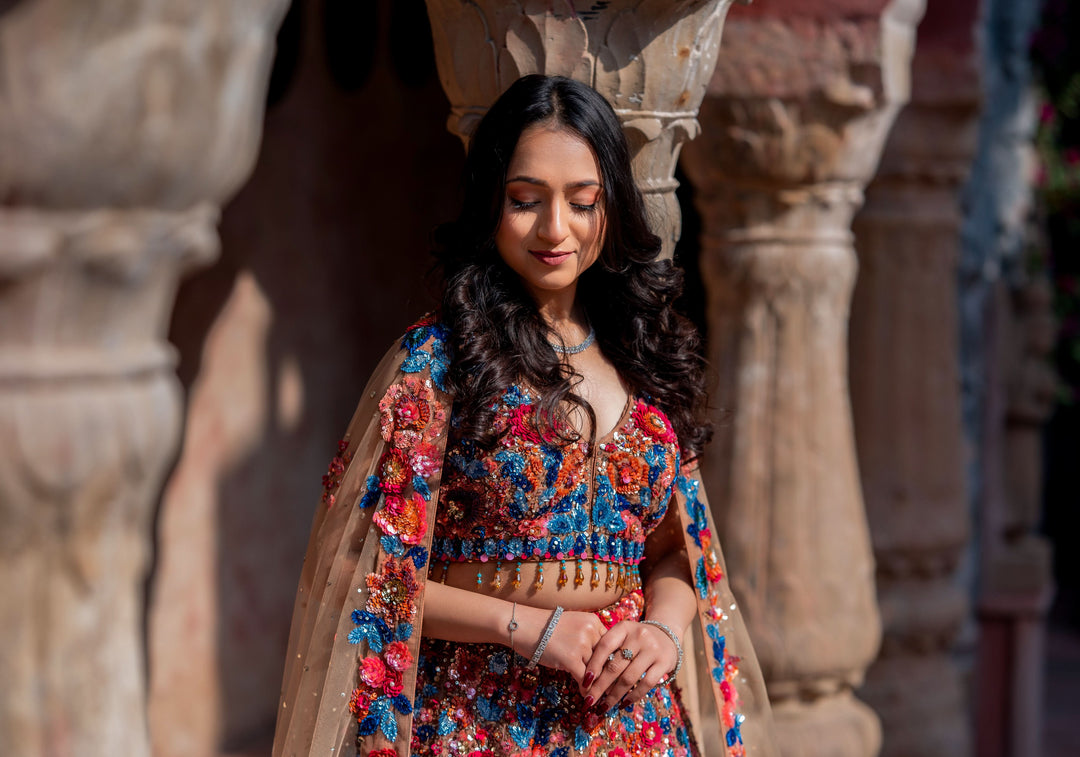 Dazzling Wildflower Lehenga with hand-embroidery in Net in Rust and Blue, Customizable, Made to Order