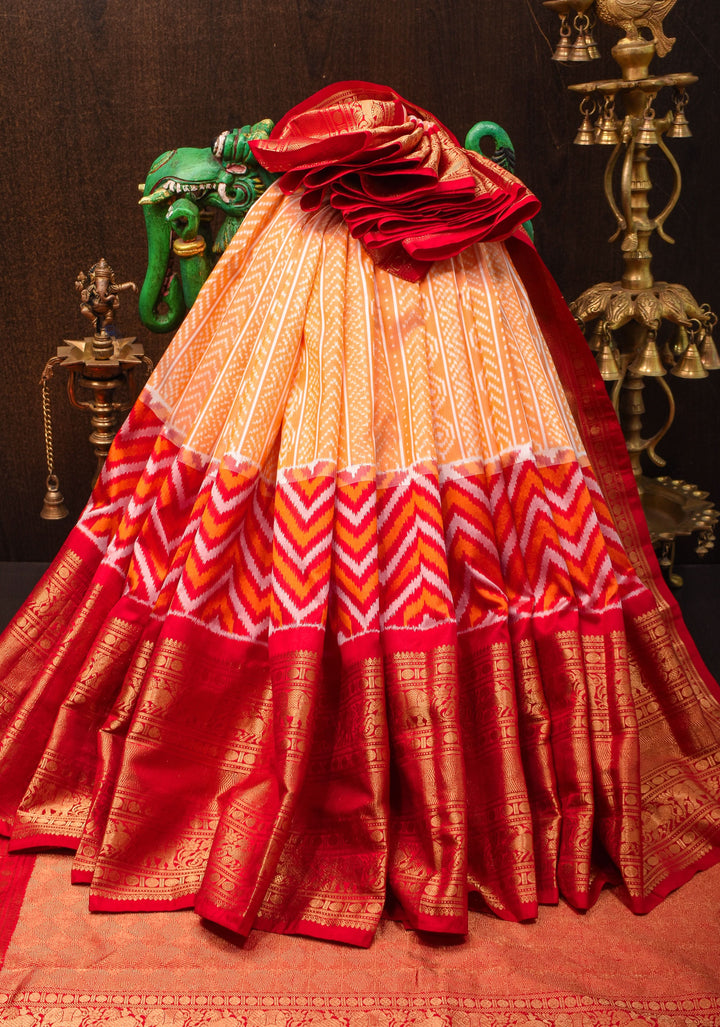 Peach Orange Ikkat Kanjivaram Fusion Pure Silk Saree with Ikkat pattern body and Zari Border| SILK MARK CERTIFIED