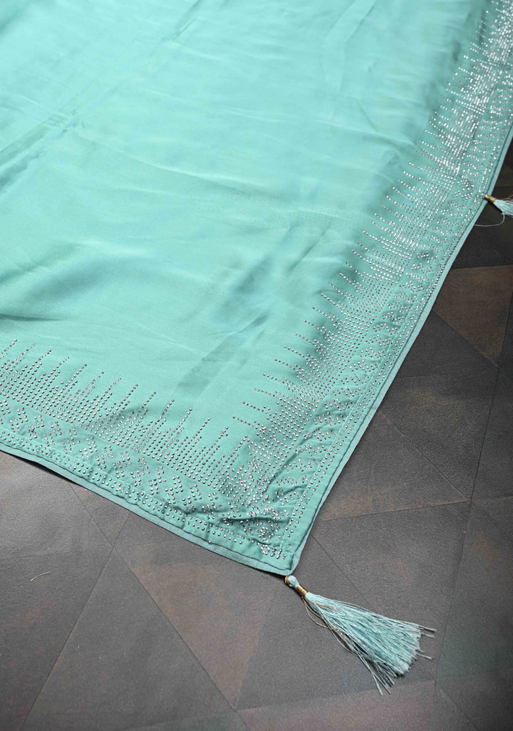 Mint Green Satin Saree with Tone on Tone Powder Stones