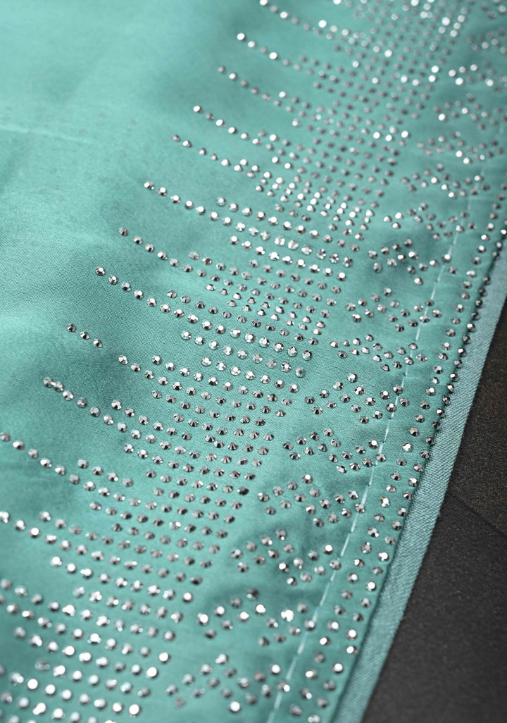 Mint Green Satin Saree with Tone on Tone Powder Stones