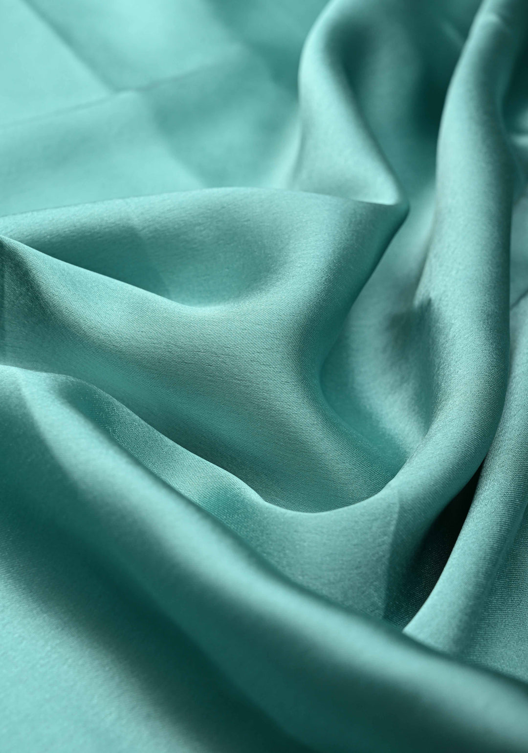 Mint Green Satin Saree with Tone on Tone Powder Stones