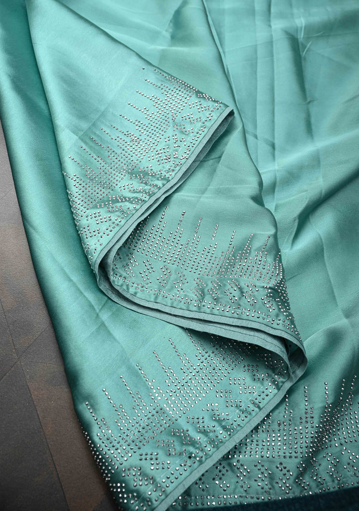 Mint Green Satin Saree with Tone on Tone Powder Stones