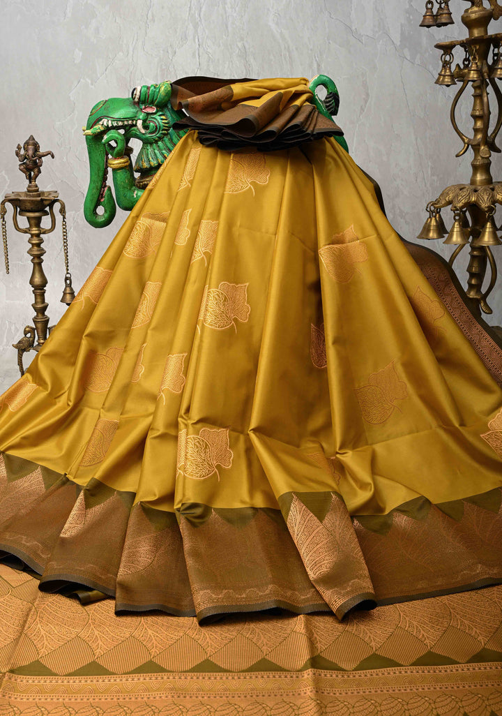 Moss Green Kanchi Semi Silk Saree with Leaf Buttas and Zari Border