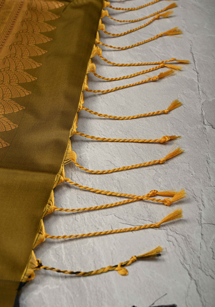 Moss Green Kanchi Semi Silk Saree with Leaf Buttas and Zari Border