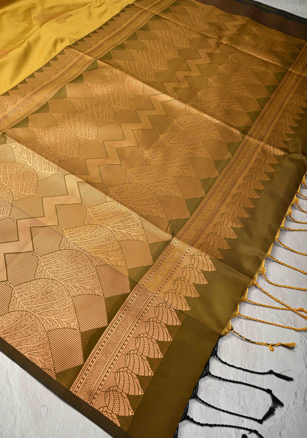 Moss Green Kanchi Semi Silk Saree with Leaf Buttas and Zari Border