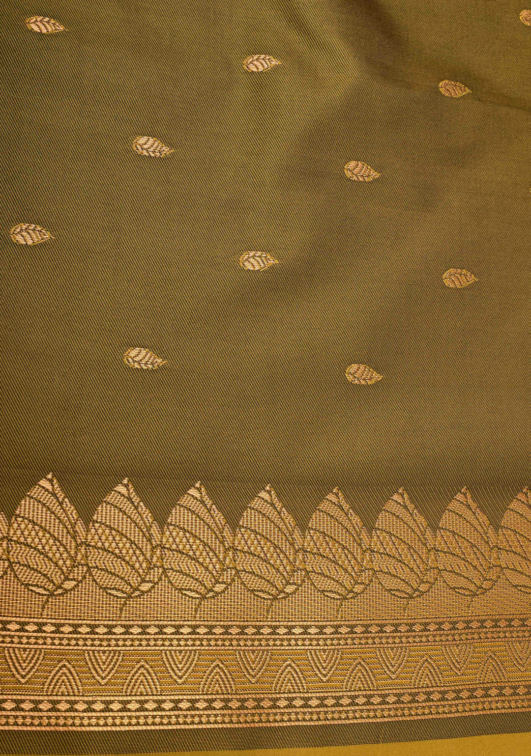 Moss Green Kanchi Semi Silk Saree with Leaf Buttas and Zari Border