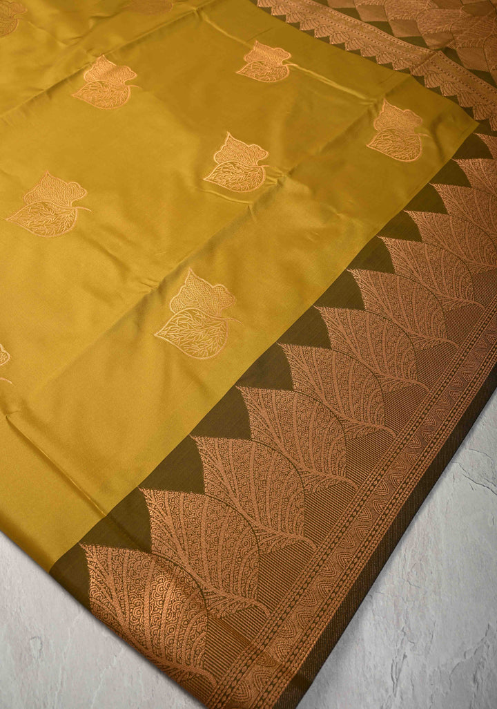 Moss Green Kanchi Semi Silk Saree with Leaf Buttas and Zari Border