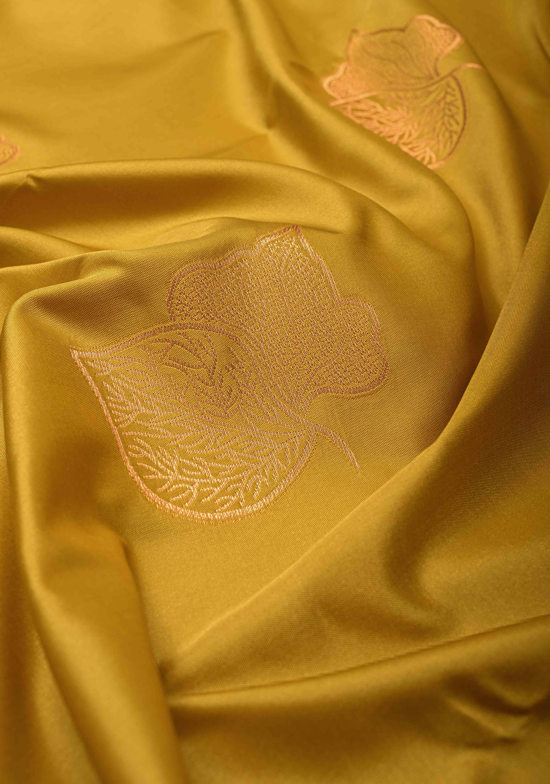 Moss Green Kanchi Semi Silk Saree with Leaf Buttas and Zari Border
