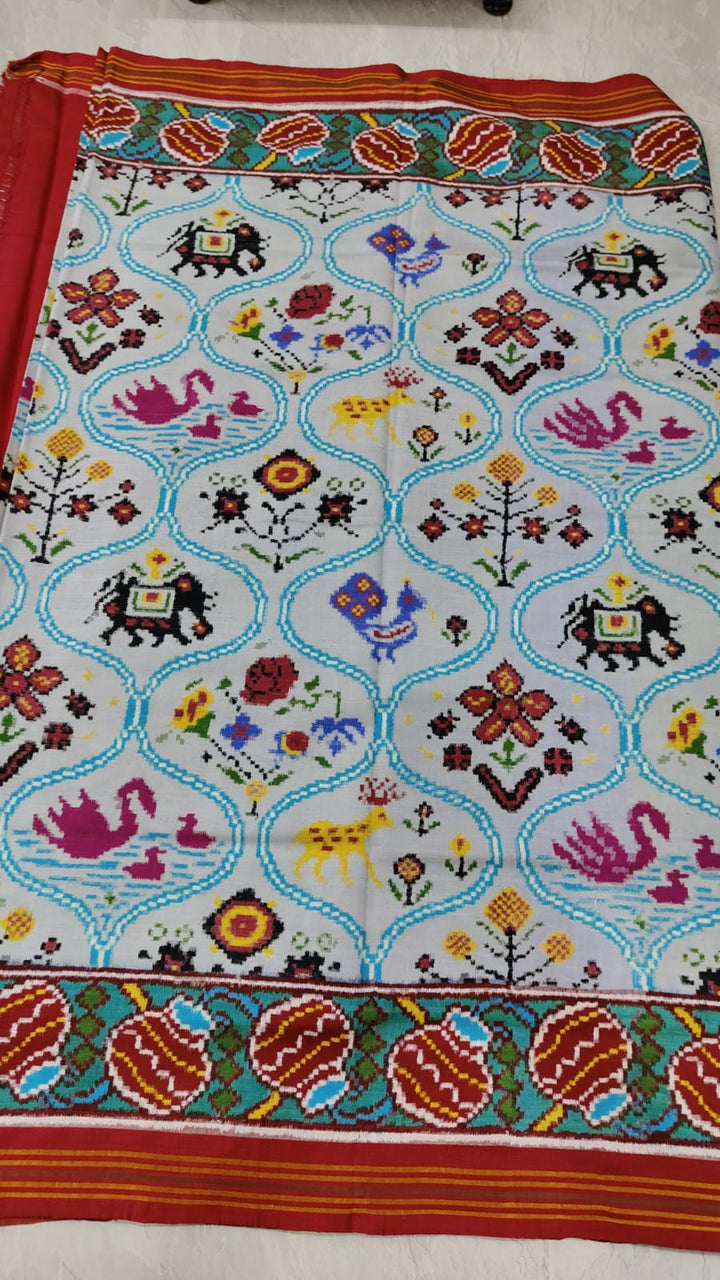 Gray Patan Patola double ikkat silk saree with Trellis Pattern flora and fauna Theme | SILK MARK CERTIFIED