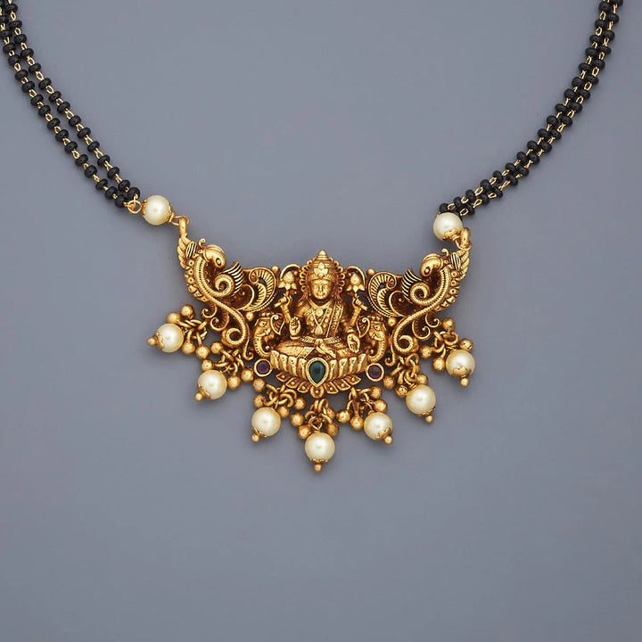 Traditional Gold-Plated Mangalsutra with Lakshmi Pendant and Pearl Embellishments