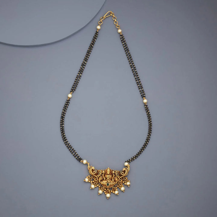 Traditional Gold-Plated Mangalsutra with Lakshmi Pendant and Pearl Embellishments