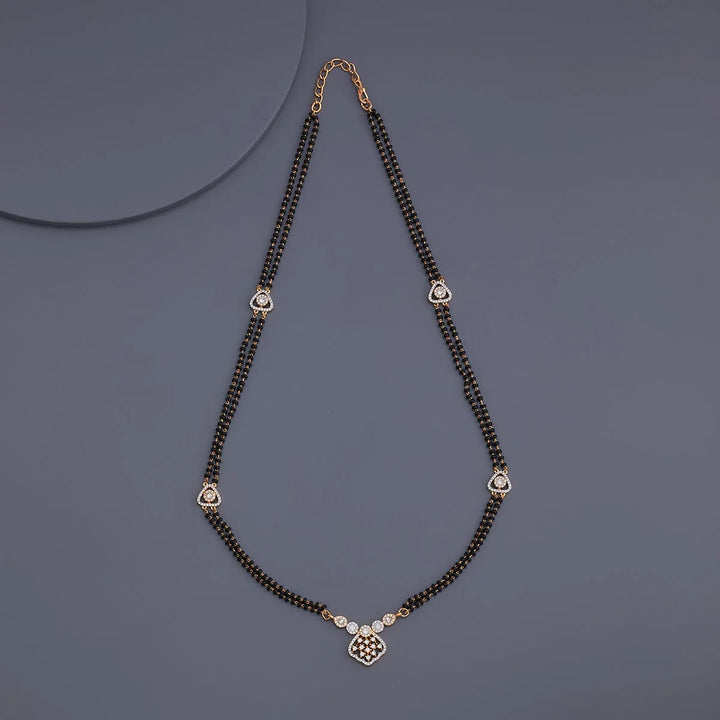 Contemporary Two-Strand Mangalsutra with Geometric Zircon and Black Bead Design | Shobitam