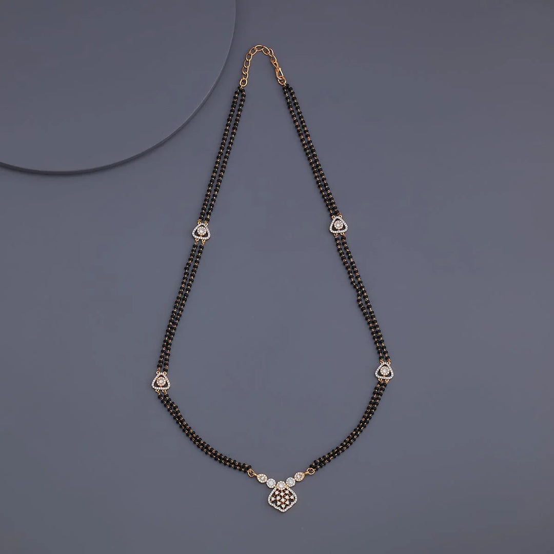 Contemporary Two-Strand Mangalsutra with Geometric Zircon and Black Bead Design | Shobitam