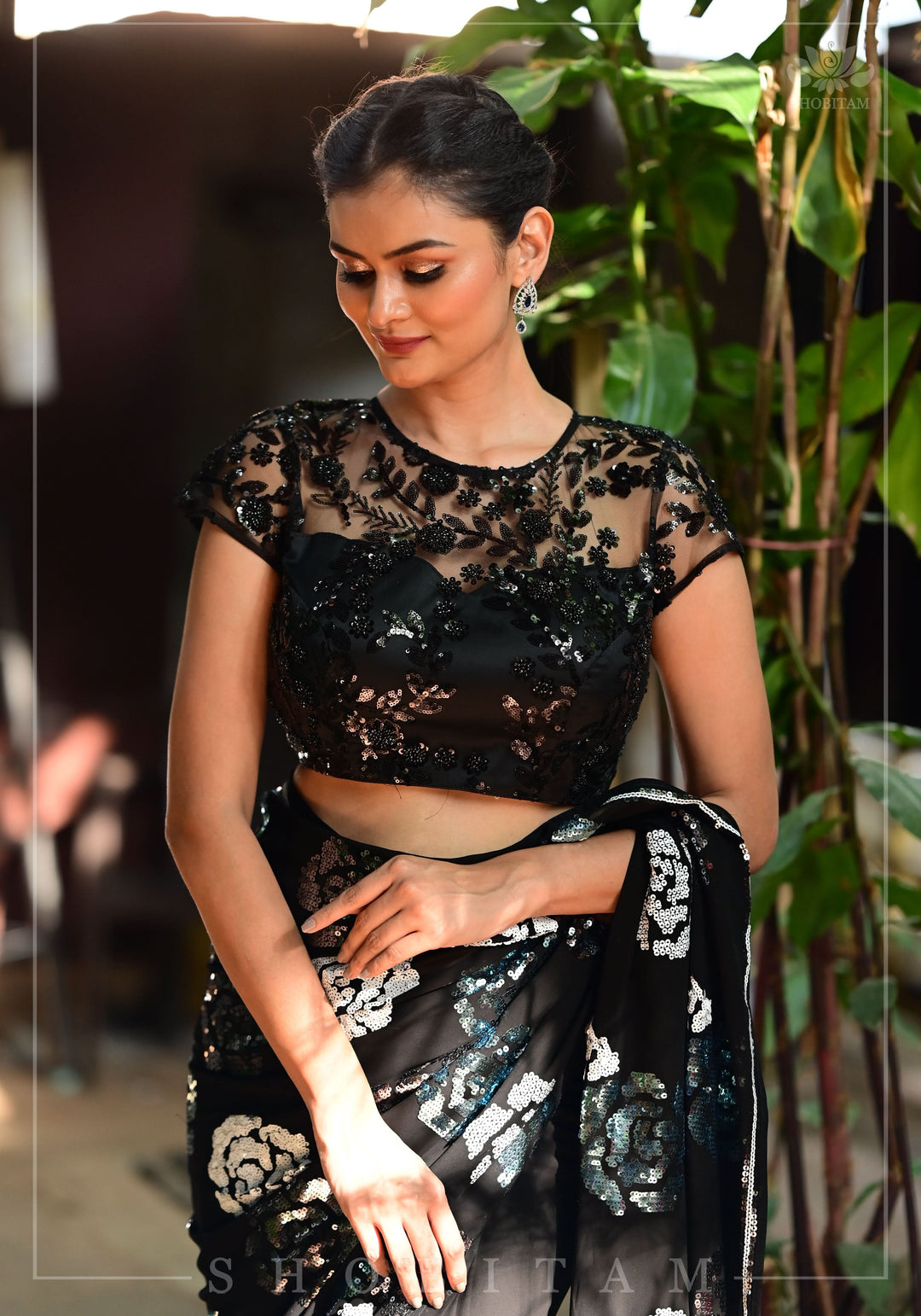 Stunning Black Net Blouse with Sheer Yoke and Shimmering Black Floral Design Sequins