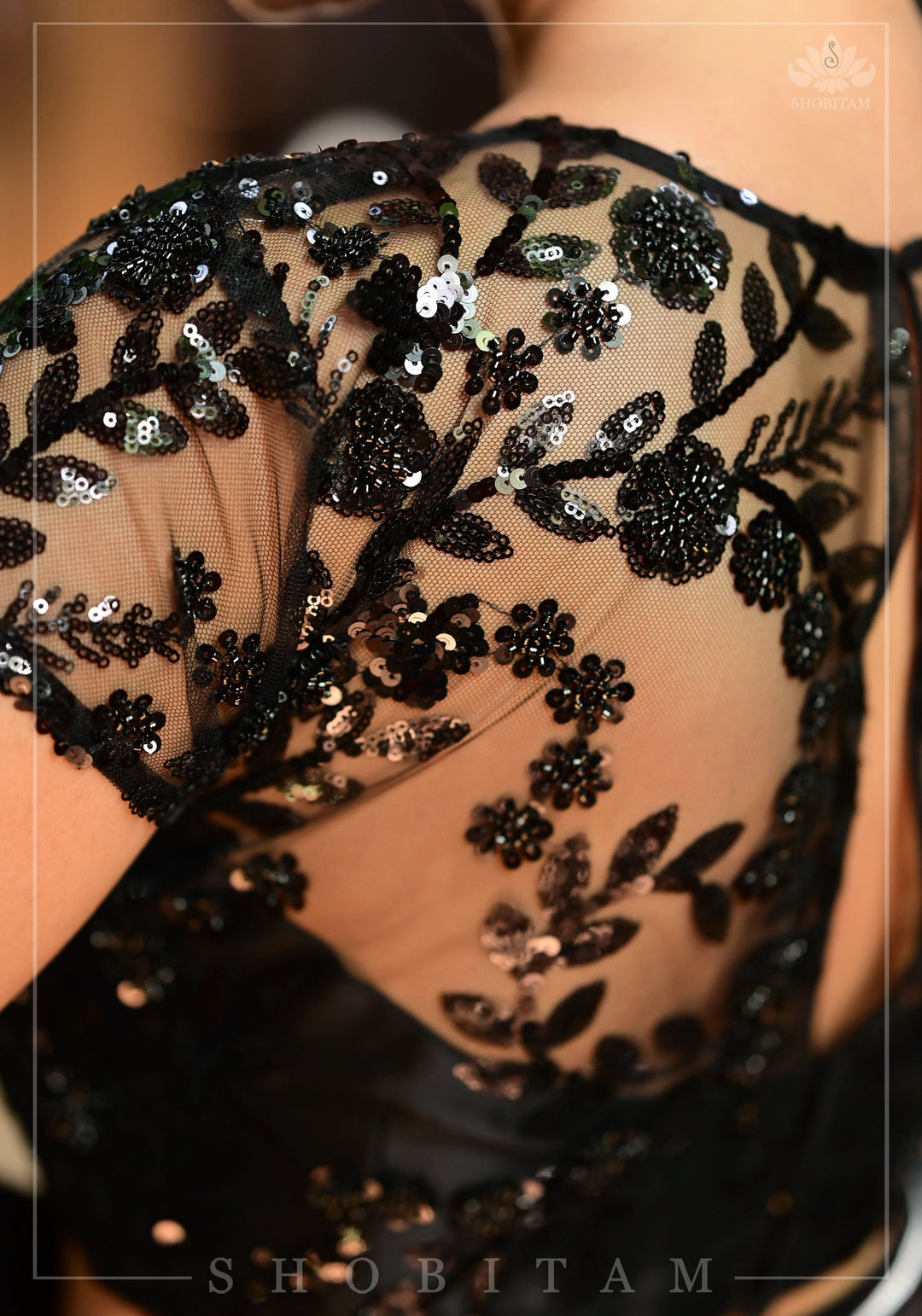 Stunning Black Net Blouse with Sheer Yoke and Shimmering Black Floral Design Sequins